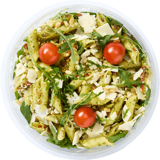 Foto van Healthy Hand Salade pasta pesto op witte achtergrond