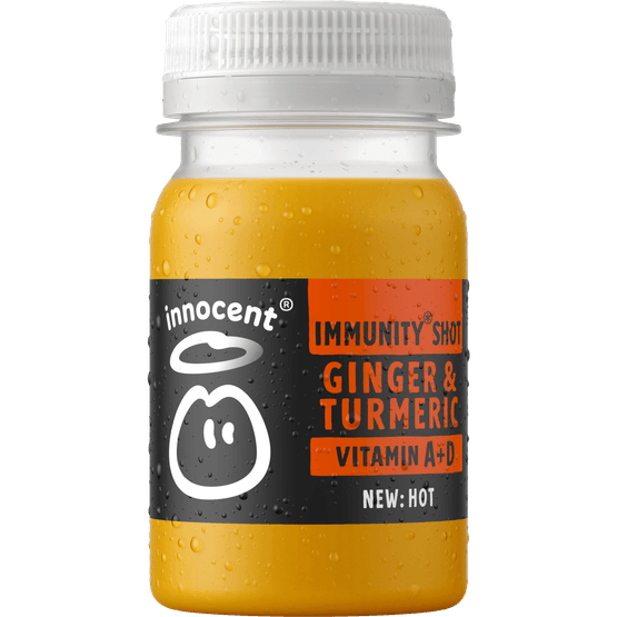 Foto van Innocent shot Ginger & turmeric hot op witte achtergrond