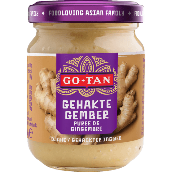 Foto van Go-Tan Gehakte gember op witte achtergrond