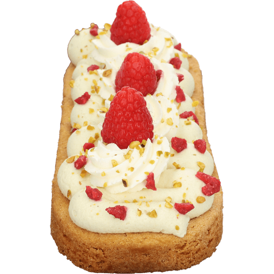 Foto van Pistache frambozen slof op witte achtergrond