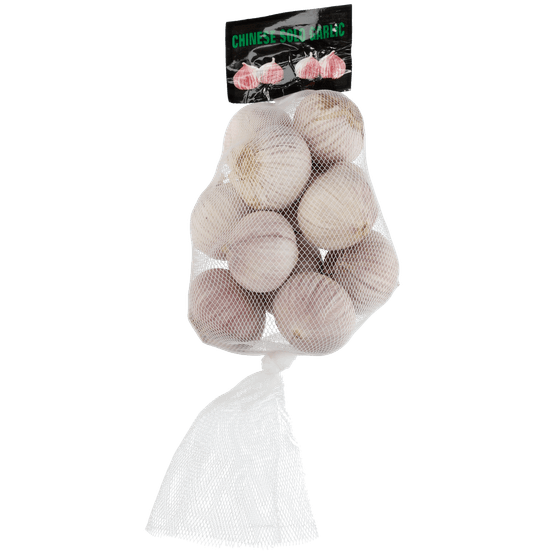 Foto van Knoflook uien solo op witte achtergrond