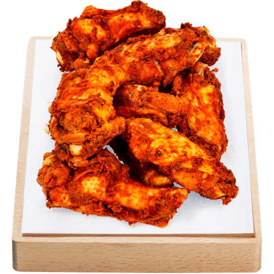 Foto van Gegaarde kipkluifjes pittig op witte achtergrond