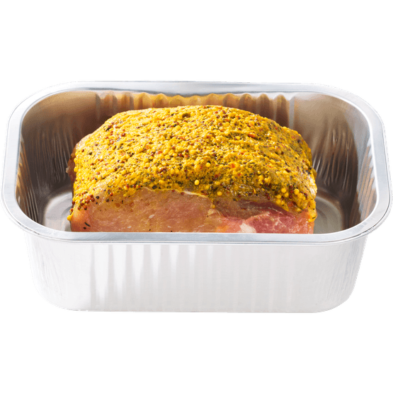 Foto van Varkensfilet braadstuk honing mosterd op witte achtergrond