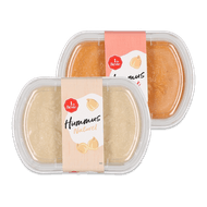 1 de Beste Hummus of groentespread Foto van 1 de Beste Hummus of groentespread